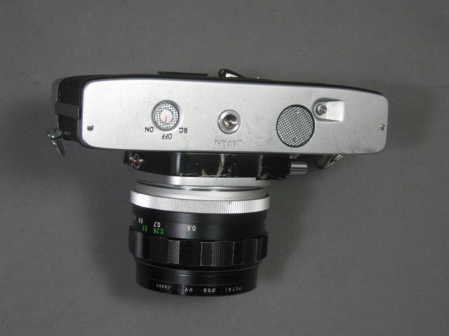 Minolta SRT 101 35mm SLR Film Camera 58mm f/1.4 2.8 Lens Vivitar Flash Case/Bag+ 4