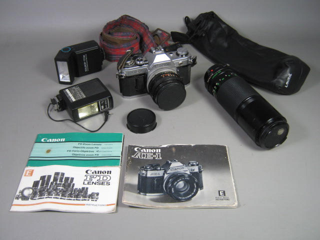 Canon AE-1 35mm Camera FD Lens 100-200mm 1:5.6 Zoom 50mm 1:1.8 Flashes Manual NR