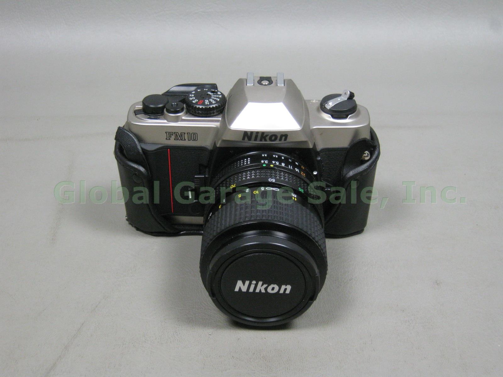 Nikon FM10 35mm SLR Film Camera Zoom Nikkor 35-70mm 1:3.5~4.8 Lens Case Bundle