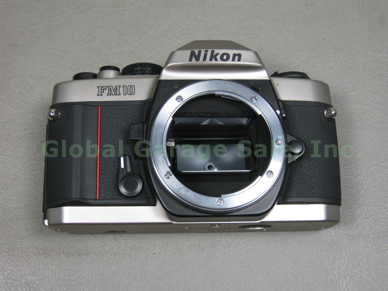 Nikon FM10 35mm SLR Film Camera Zoom Nikkor 35-70mm 1:3.5~4.8 Lens Case Bundle 3