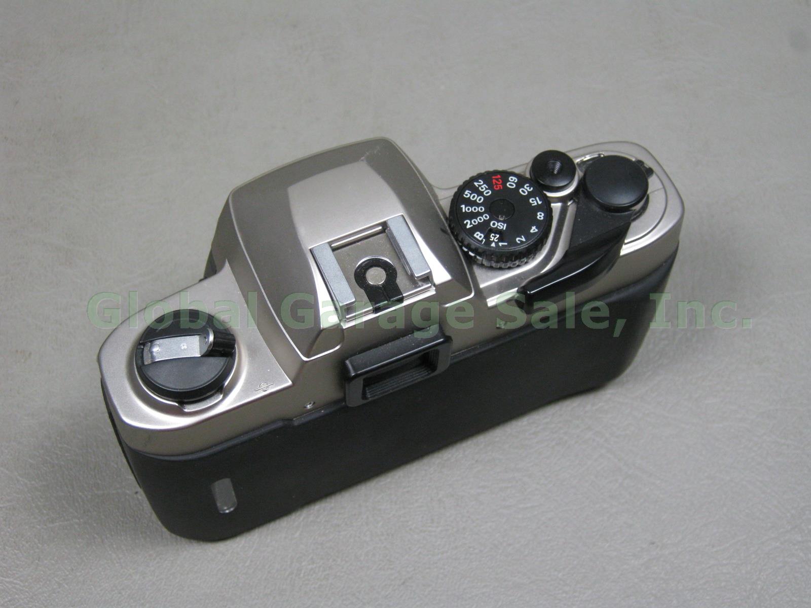 Nikon FM10 35mm SLR Film Camera Zoom Nikkor 35-70mm 1:3.5~4.8 Lens Case Bundle 4