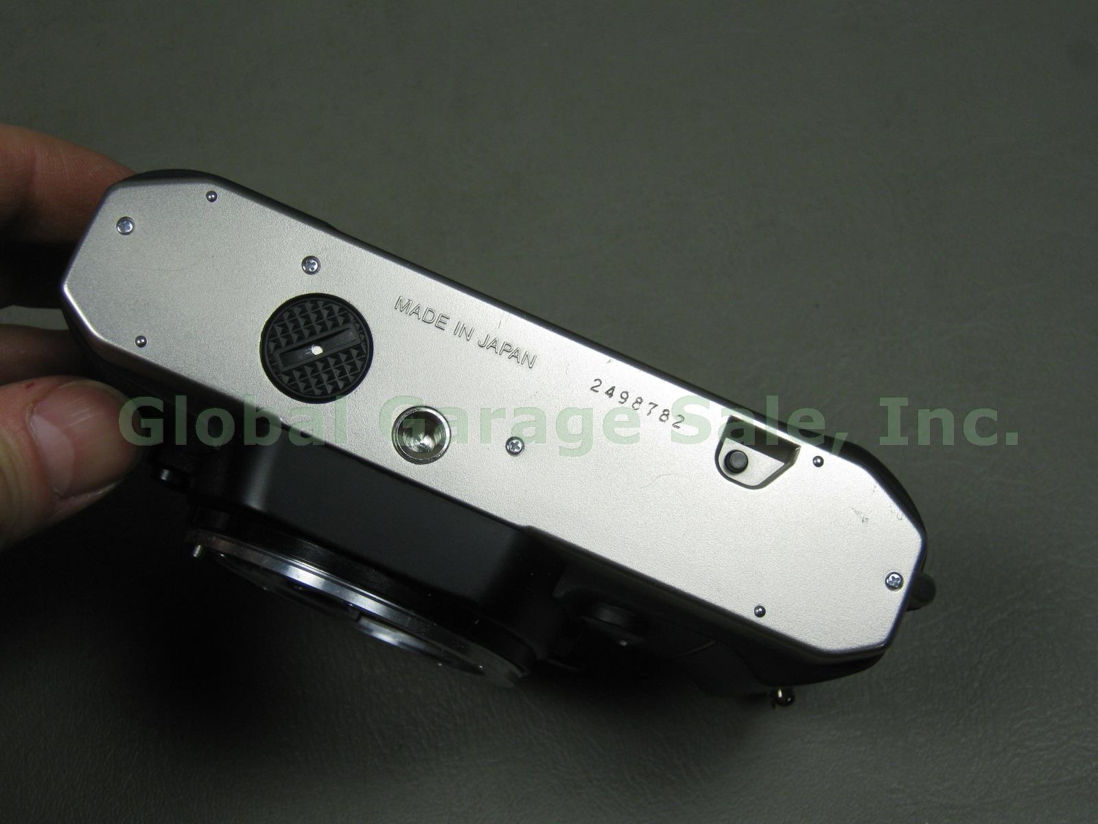 Nikon FM10 35mm SLR Film Camera Zoom Nikkor 35-70mm 1:3.5~4.8 Lens Case Bundle 5
