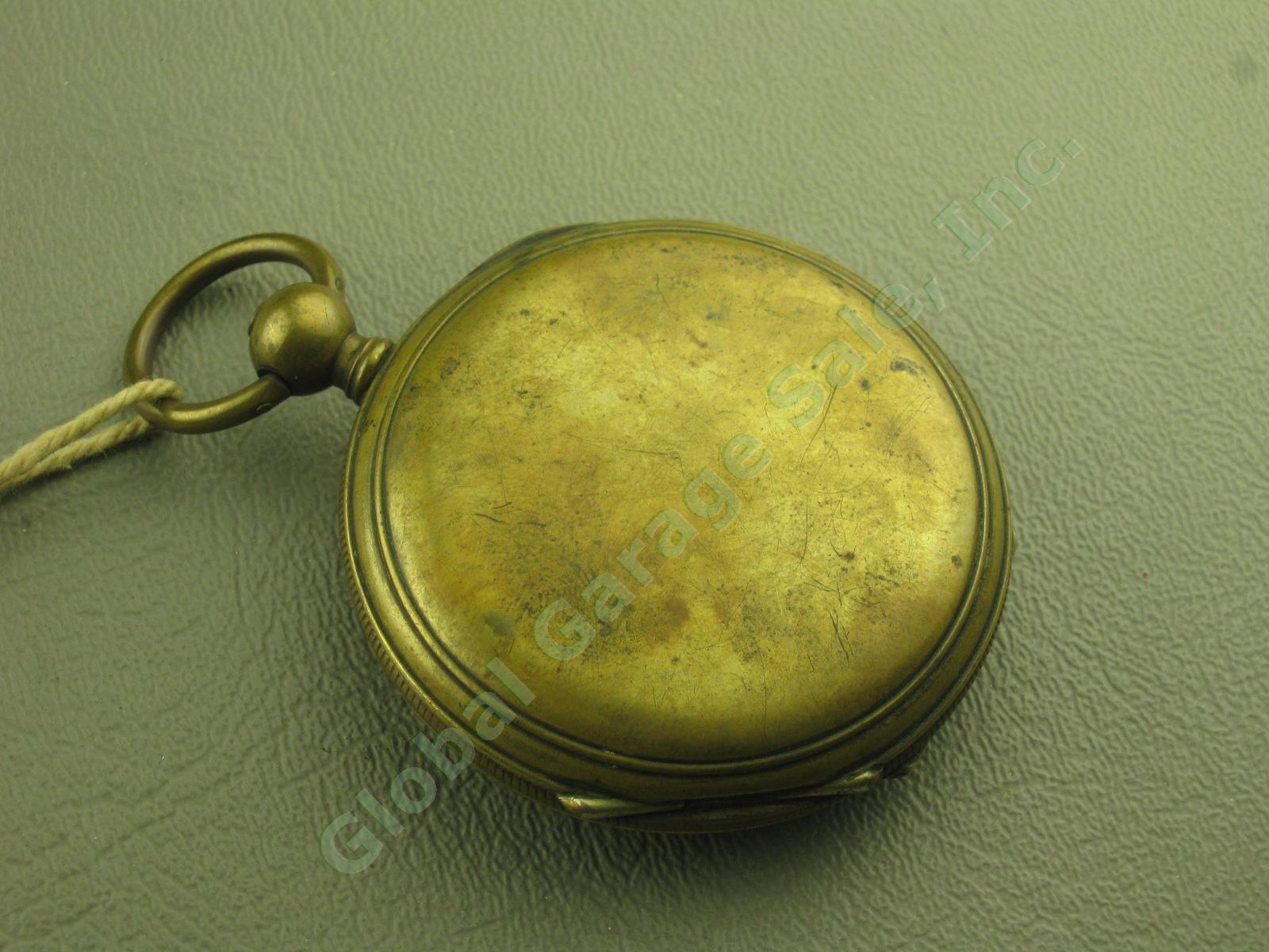 Unknown Vtg Antique Brass Key Wind Pocket Watch W/ SAD Crown Shield Mark Stamp 5