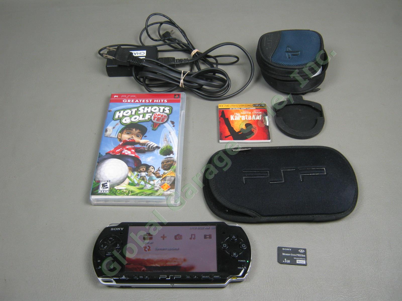 Sony PSP-2000 + Charger Battery 8 Games 1 Movie 1GB Memory Card Case Bundle Lot