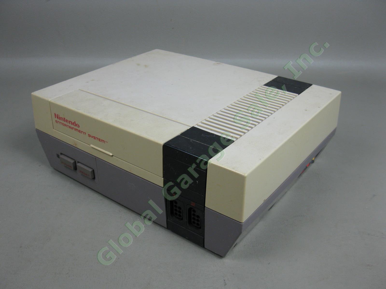 Nintendo NES-001 Console System 8 Games 2 Controllers Zapper Gun Game Genie Lot 3
