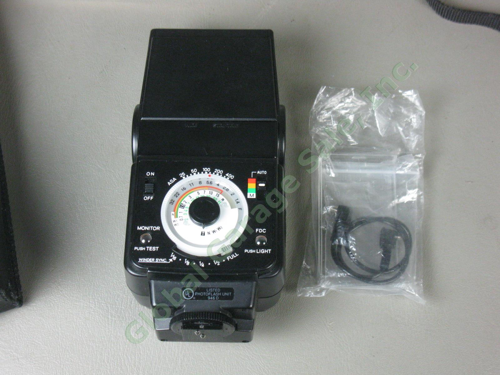 Minolta XD-11 SLR Camera MD 28-85mm 1:3.5-4.5 Zoom Lens Auto 320X Flash +Manuals 10