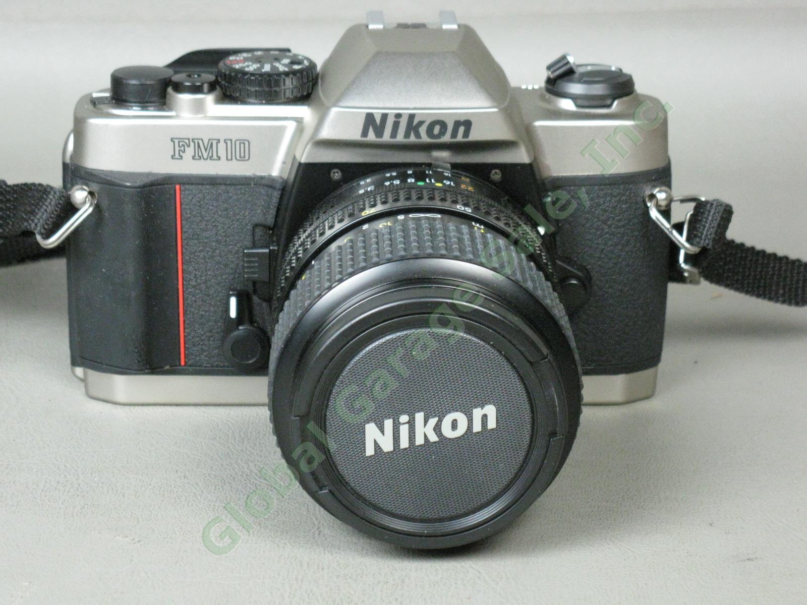 Nikon FM10 35mm SLR Film Camera Nikkor 35-70mm 1:3.5-4.8 Zoom Lens Exc Cond NR! 1