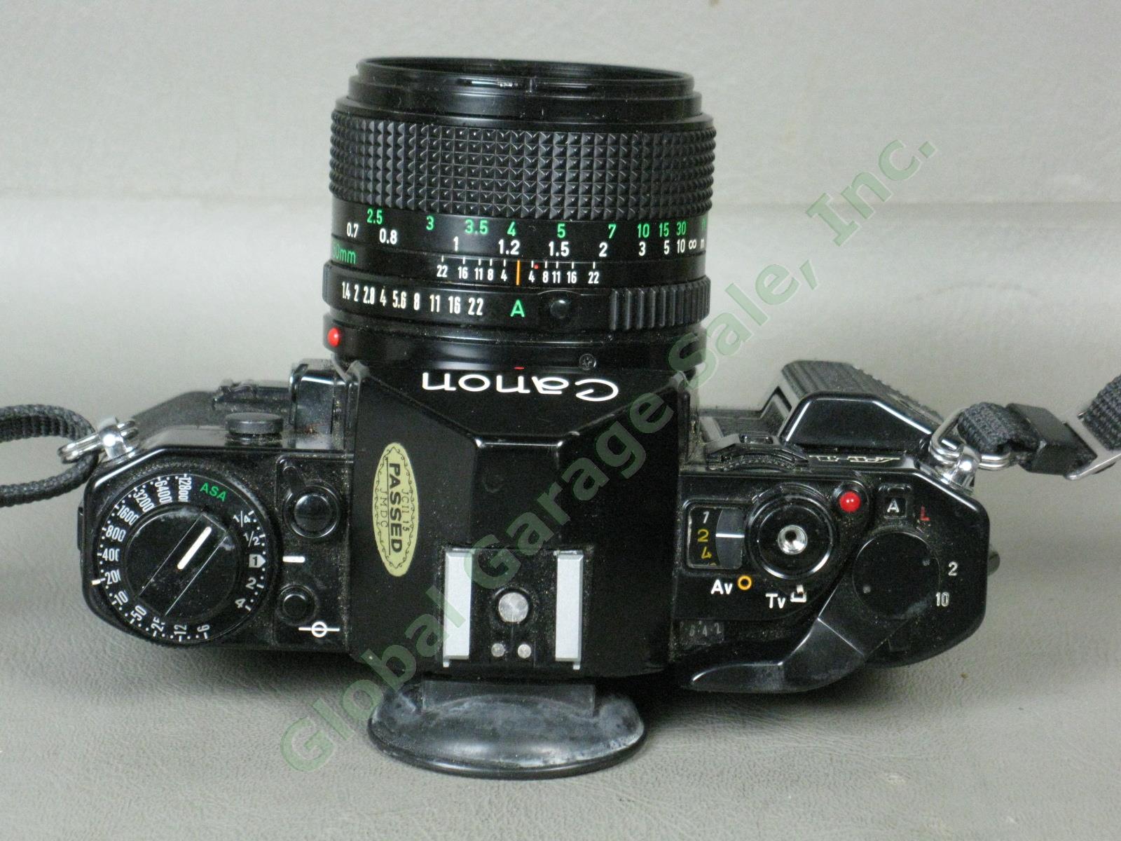 Canon A-1 SLR Camera 50mm f/1.4 f/1.8 FD Macro f/3.5 Lens Minolta Flash Bundle 5