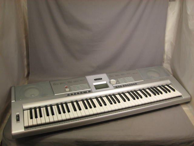 Yamaha DGX-205 Portable Grand Electronic Keyboard + NR 1