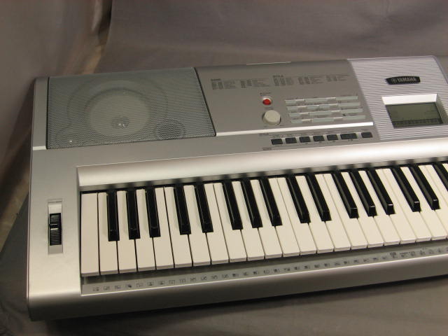Yamaha DGX-205 Portable Grand Electronic Keyboard + NR 2