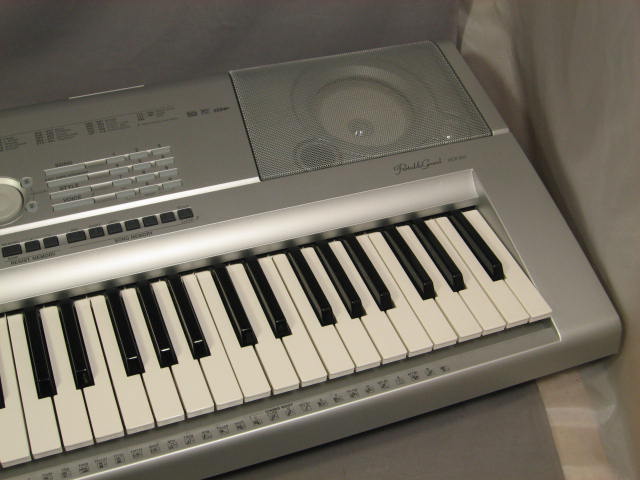 Yamaha DGX-205 Portable Grand Electronic Keyboard + NR 4