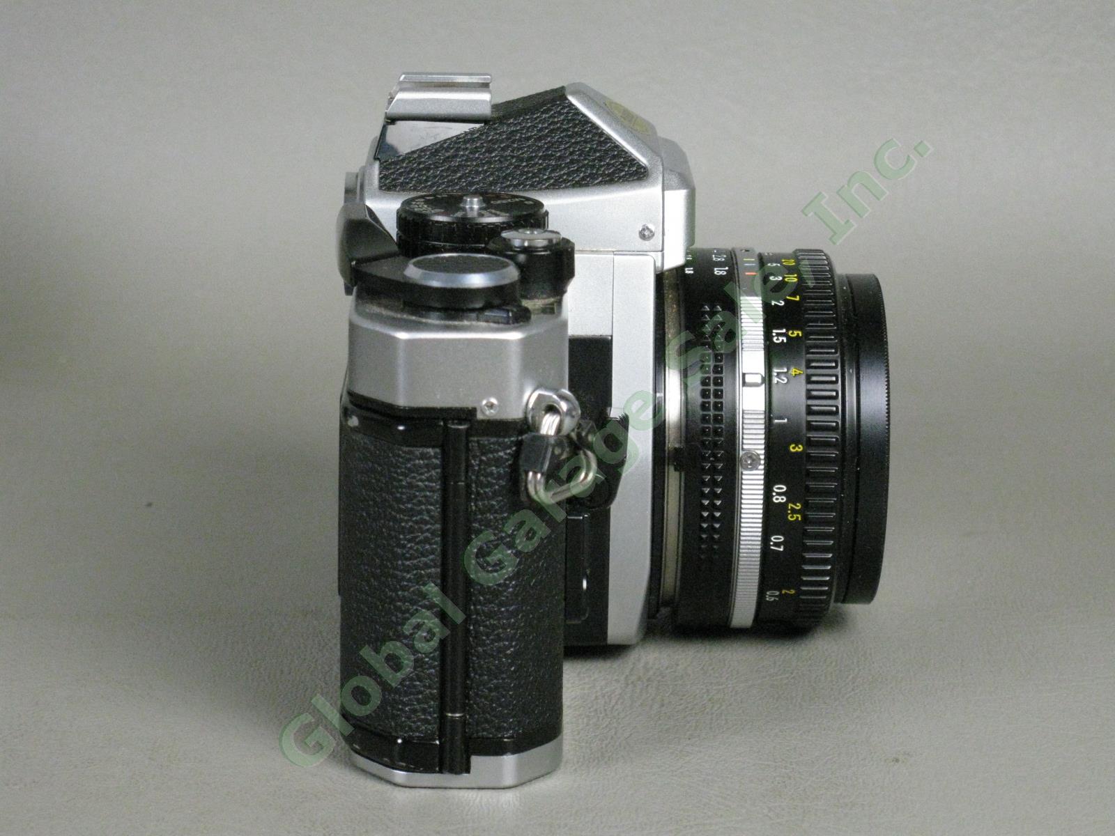 Nikon FE2 35mm Camera Nikkor 50mm f/1.8 Lens Case Manual Promaster Flash Bundle 2