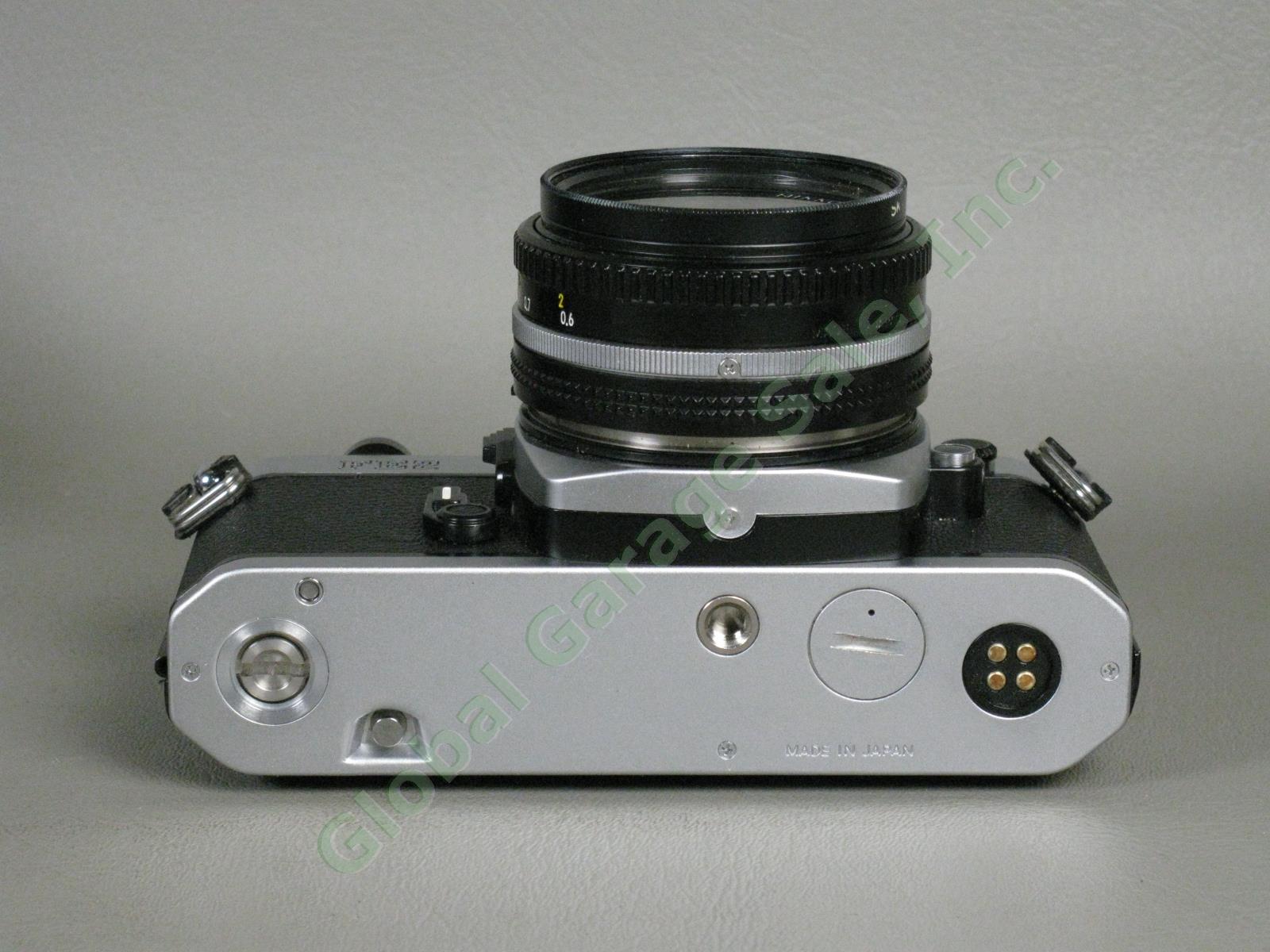 Nikon FE2 35mm Camera Nikkor 50mm f/1.8 Lens Case Manual Promaster Flash Bundle 6