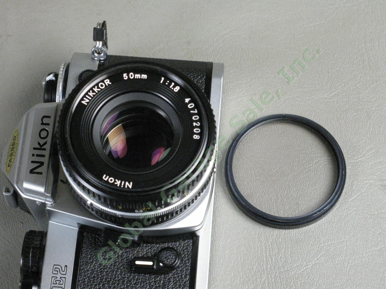 Nikon FE2 35mm Camera Nikkor 50mm f/1.8 Lens Case Manual Promaster Flash Bundle 7