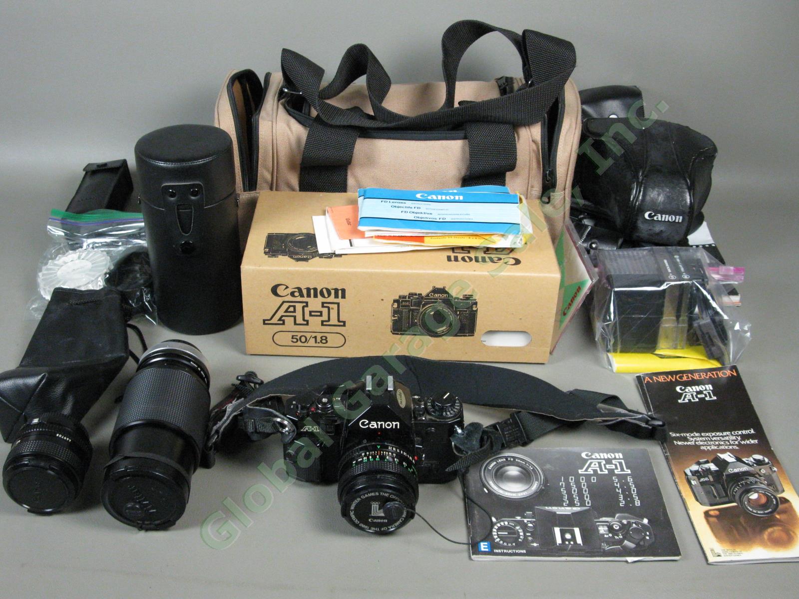 Canon A1 35mm Camera Bundle FD 50mm 1:1.8 FD 28mm 1:2.8 Vivitar 75-205mm Zoom ++