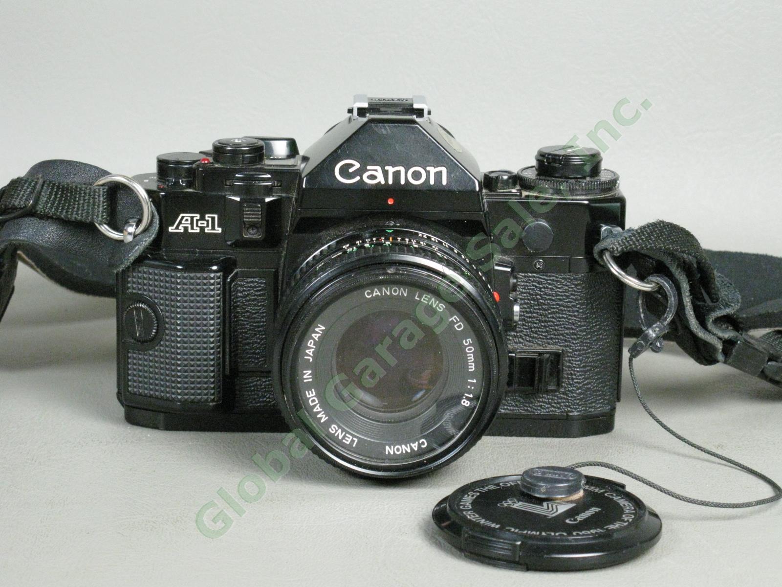Canon A1 35mm Camera Bundle FD 50mm 1:1.8 FD 28mm 1:2.8 Vivitar 75-205mm Zoom ++ 1