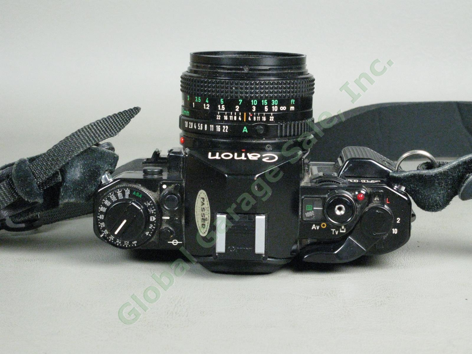 Canon A1 35mm Camera Bundle FD 50mm 1:1.8 FD 28mm 1:2.8 Vivitar 75-205mm Zoom ++ 5