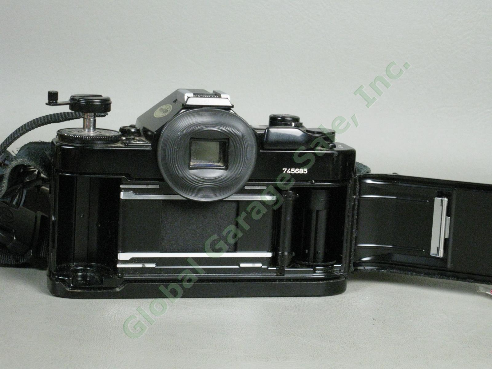Canon A1 35mm Camera Bundle FD 50mm 1:1.8 FD 28mm 1:2.8 Vivitar 75-205mm Zoom ++ 7