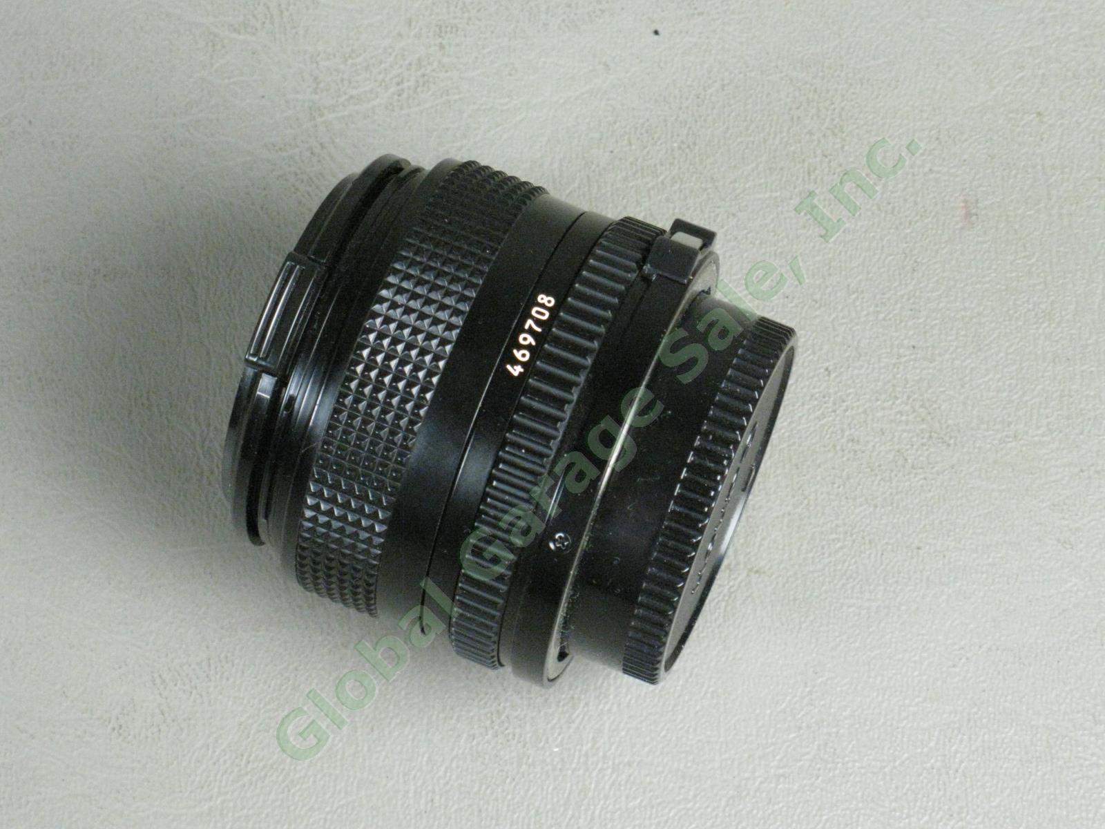 Canon A1 35mm Camera Bundle FD 50mm 1:1.8 FD 28mm 1:2.8 Vivitar 75-205mm Zoom ++ 13