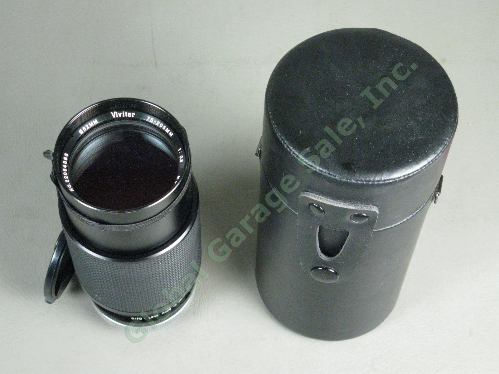 Canon A1 35mm Camera Bundle FD 50mm 1:1.8 FD 28mm 1:2.8 Vivitar 75-205mm Zoom ++ 14