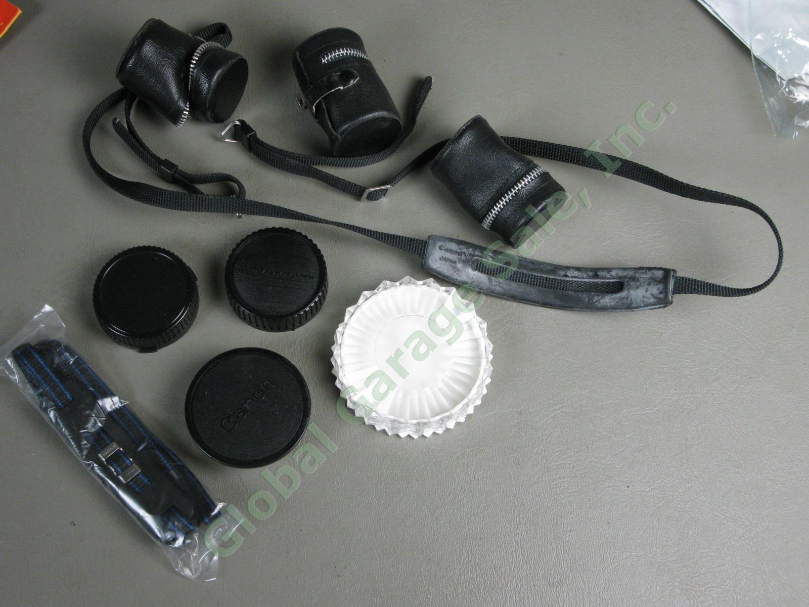Canon A1 35mm Camera Bundle FD 50mm 1:1.8 FD 28mm 1:2.8 Vivitar 75-205mm Zoom ++ 23