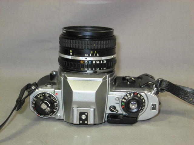 Nikon FG SLR 28mm f/2.8 50mm f/1.8 70-210mm f/4 Lens + 4