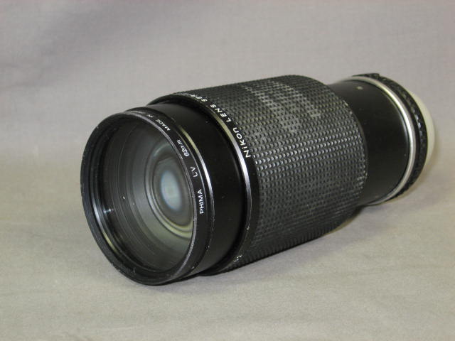 Nikon FG SLR 28mm f/2.8 50mm f/1.8 70-210mm f/4 Lens + 7