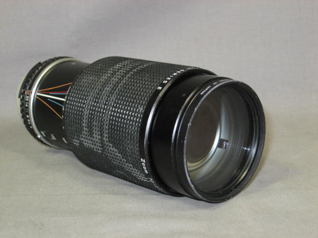 Nikon FG SLR 28mm f/2.8 50mm f/1.8 70-210mm f/4 Lens + 8