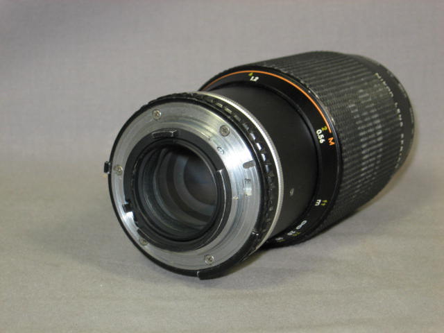 Nikon FG SLR 28mm f/2.8 50mm f/1.8 70-210mm f/4 Lens + 9