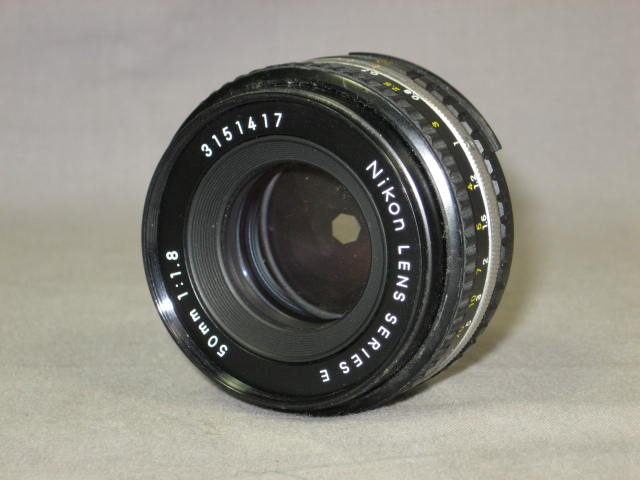 Nikon FG SLR 28mm f/2.8 50mm f/1.8 70-210mm f/4 Lens + 10