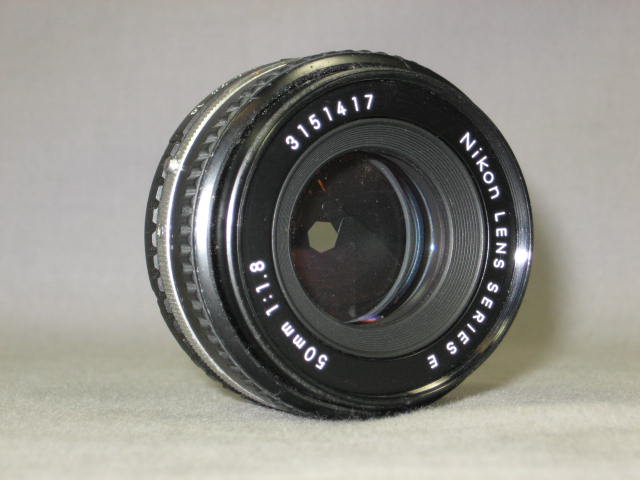 Nikon FG SLR 28mm f/2.8 50mm f/1.8 70-210mm f/4 Lens + 11