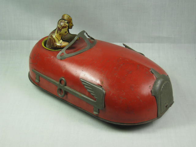 Vtg Red Wind-Up Tin Litho Toy Convertible Car W/ Driver Couple Greatest Strauss
