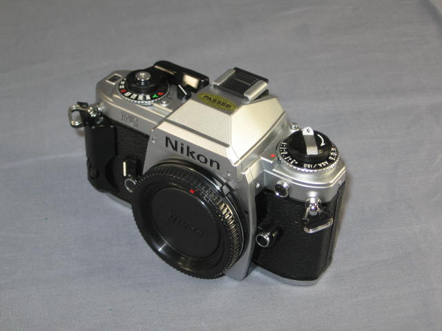Nikon FG 35mm SLR Camera Nikkor AIS 50mm f/1.8 135mm + 1