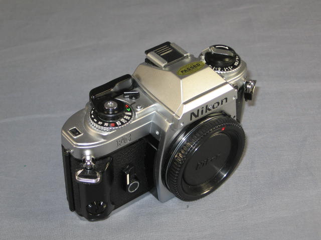 Nikon FG 35mm SLR Camera Nikkor AIS 50mm f/1.8 135mm + 2