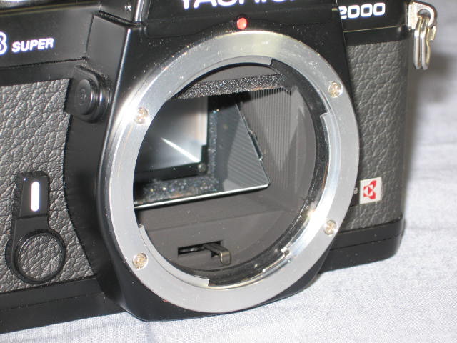 Yashica FX-3 Super 2000 +108 SLR Cameras W/4 Lenses+ NR 3